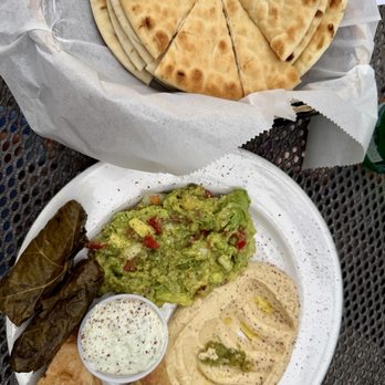 The Grape Leaf - MEZZA SAMPLER with hummus, spanakopita, avocado dip. and add grape leaves 5 - with pita - Mediterranean Near Me - Louisville, Kentucky