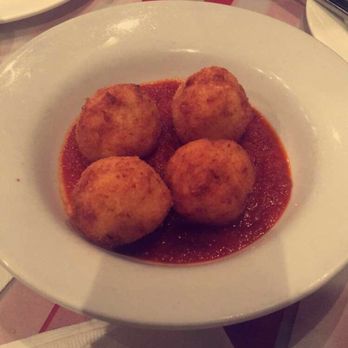 Taverniti - Arancini, stuffed with cheese with a crispy outside. - Italian Near Me - Toronto, Ontario Taverniti - Arancini, stuffed with cheese with a crispy outside. - Italian Near Me - Toronto, Ontario