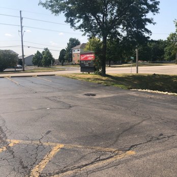 Huskie's Discount Liquor - empty parking lot - Beer, Wine & Spirits Near Me - DeKalb, Illinois Huskie's Discount Liquor - empty parking lot - Beer, Wine & Spirits Near Me - DeKalb, Illinois