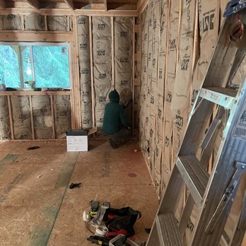 D&N Rivera Construction - a man working on a house under construction - General Contractors Near Me