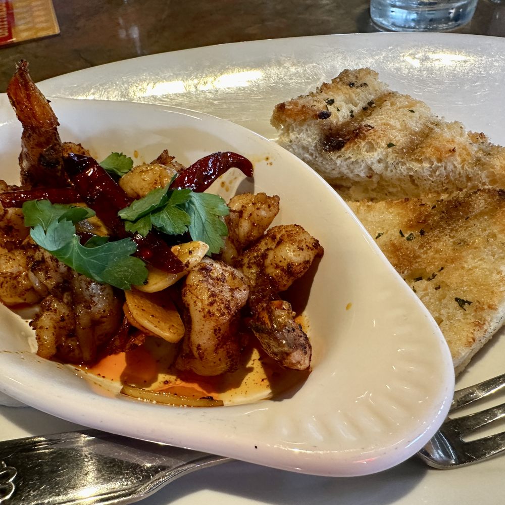 Lombard's Seafood Grille - Monterey Garlic Shrimp. Look at that garlic. So delicious and spicy - Seafood Near Me - Orlando, Florida