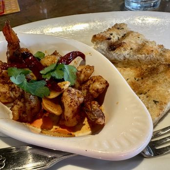 Lombard's Seafood Grille - Monterey Garlic Shrimp. Look at that garlic. So delicious and spicy - Seafood Near Me - Orlando, Florida Lombard's Seafood Grille - Monterey Garlic Shrimp. Look at that garlic. So delicious and spicy - Seafood Near Me - Orlando, Florida