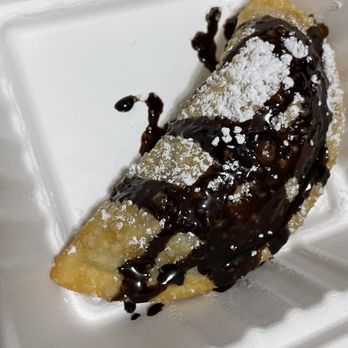 Chiddy's Cheesesteaks - a slice of cheesesteaks with chocolate sauce and powdered sugar - Sandwiches Near Me - Astoria, New York Chiddy's Cheesesteaks - a slice of cheesesteaks with chocolate sauce and powdered sugar - Sandwiches Near Me - Astoria, New York