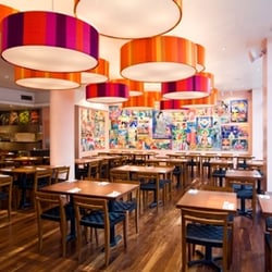 Masala Zone - Bayswater - Masala Zone Bayswater features bold, vibrant & exotic pop art collages of firecracker labels from the fire cracker town of