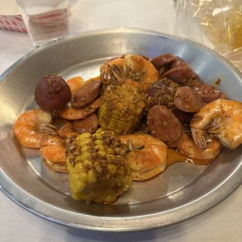 Crab & Shell Cajun Seafood - 1/2 pound Shrimp No Head  1/2 pound sausage  Corn and potatoes - Cajun/Creole Near Me - Denver, Colorado