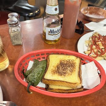 Columbine Steak House & Lounge - Texas toast with jalapeño and of course a Modelo in the background - Steakhouses Near Me - Denver, Colorado