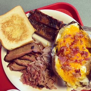 Soulman's Bar-B-Que - 2 meat plate with a couple ribs & a smoked potato. Excellent in every way! - Barbeque Near Me - Terrell, Texas