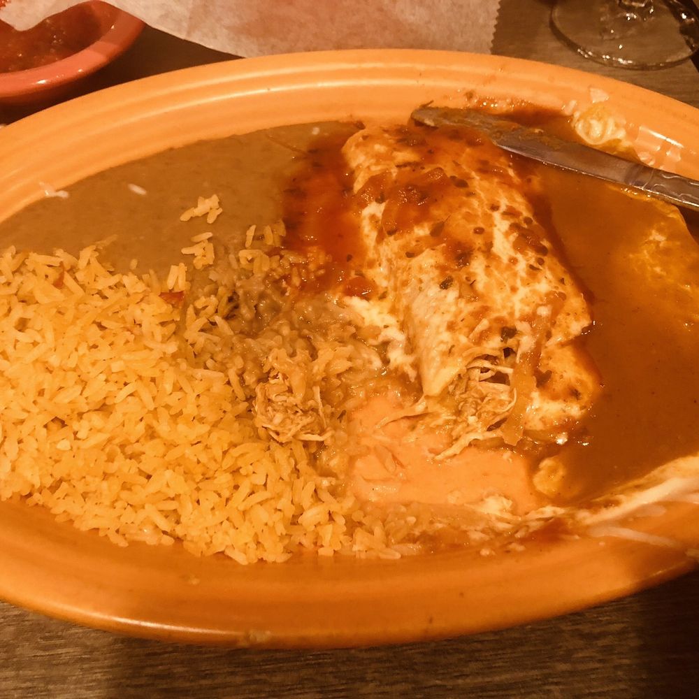Create your own chicken enchilada and chicken burrito with rice and refried beans. Create your own chicken enchilada and chicken burrito with rice and refried beans.