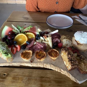 Boardroom - Avocado toast, fresh fruit, quiches, mango bread, cinnamon roll, cheeses, salami, crackers - Wine Bars Near Me - Cocoa Beach, Florida
