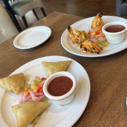 Vegetable samosas and tandoori prawns Vegetable samosas and tandoori prawns