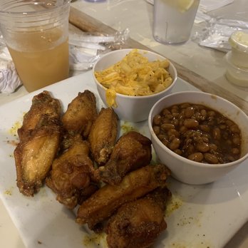 House Divided Bottle & Taps - Naked Lemon Pepper wings, baked beans (no pork) Mac and Cheese -$15  Henny Colada $16 - Wine Bars Near Me - greensboro, North Carolina