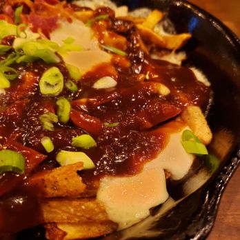 Tipsy Moose Tap & Tavern - Dark gravy and flat curds on my "poutine" - Pizza Near Me - Latham, New York