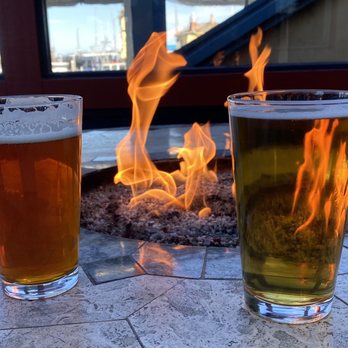 London Bridge Pub - Gas fire table  photo taken by reviewer 11/16/2020 - British Near Me - Monterey, California