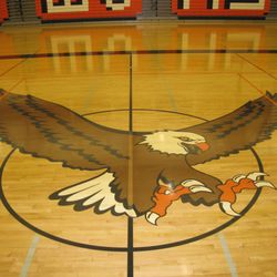 Quality Hardwood Floors of Spokane - Gymnasiums are our specialty including both logo work, lettering and game lines.