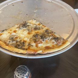 Forgot to take photo of the full pizza but the crust was good and very tasty and I don't know what kind this was.