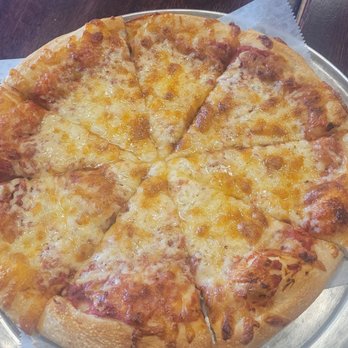 Classic Pizza - a thin crust pizza on a silver platter - Pizza Near Me - Bristol, Rhode Island Classic Pizza - a thin crust pizza on a silver platter - Pizza Near Me - Bristol, Rhode Island