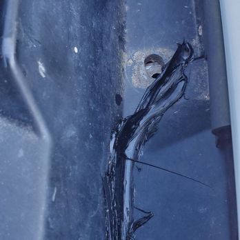 Safelite AutoGlass - More cracked trim that they then tried to hide with sealant - Windshield Installation & Repair Near Me - Charleston, West Virginia Safelite AutoGlass - More cracked trim that they then tried to hide with sealant - Windshield Installation & Repair Near Me - Charleston, West Virginia