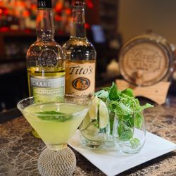"Basile" Basil Martini -
Titos Vodka, sweet chartreuse liqueur, muddled with basil and mint, fresh lime juice