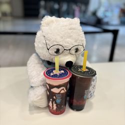 Teddy Boba - Teddy bear enjoying our Strawberry Shake with chocolate drizzle & heart jelly and our Strawberry Passion Tea with boba & heart jelly!