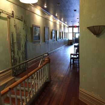 Wayfarer Hotel  - The hallway after you climb the stairs from the street. - Hotels Near Me - Monroe, Georgia