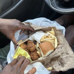 Chicken in a paper bag with soggy, half cooked fries. The fries were inedible. I ate 2 or 3 to make sure. Chicken in a paper bag with soggy, half cooked fries. The fries were inedible. I ate 2 or 3 to make sure.