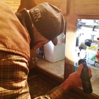 Proline Inspection - Wade checking under the sink. - Home Inspectors Near Me Proline Inspection - Wade checking under the sink. - Home Inspectors Near Me