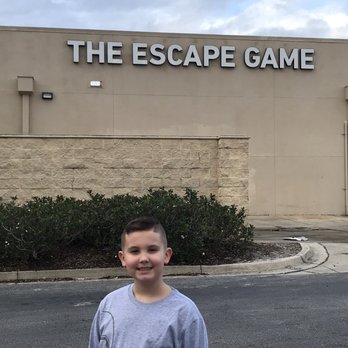 The Escape Game Jacksonville - Behind building with the Birthday boy! - Escape Games Near Me - Jacksonville, Florida The Escape Game Jacksonville - Behind building with the Birthday boy! - Escape Games Near Me - Jacksonville, Florida