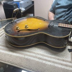 C.B. Perkins Co - Gibson ES-125T pre-repair (broken neck)