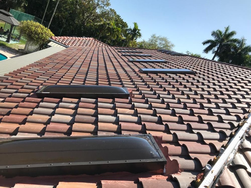 Slide of Alex Roofing