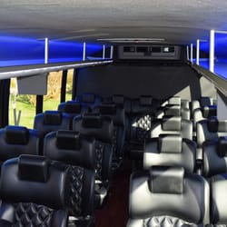Big Ben Transportation - 28 passenger bus with Bentley leather seats, USB/ outlet plugs by every seat, TV, DVD