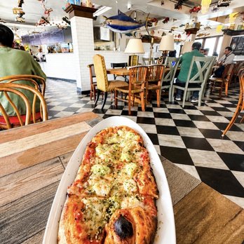 Frankie's Crab Stand - Relax inside our bright dining room with fun décor and views of Fisherman's Wharf. - Seafood Near Me - San Francisco, California Frankie's Crab Stand - Relax inside our bright dining room with fun décor and views of Fisherman's Wharf. - Seafood Near Me - San Francisco, California