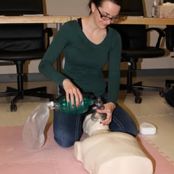 Saving Grace Medical Academy - YEG Basic Life Support Courses - Emily is demonstrating the Bag Valve Mask Technique taught by the Heart & Stroke, we offer Basic Life Support for Health Care...