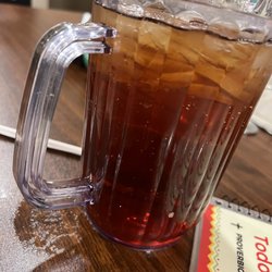 Doña Carmen's Restaurnant - Los Fresnos - Sweet tea in individual personal pitchers .