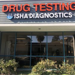 Isha Diagnostics - Business front with lighted exterior sign as seen from the S Park Victoria Dr