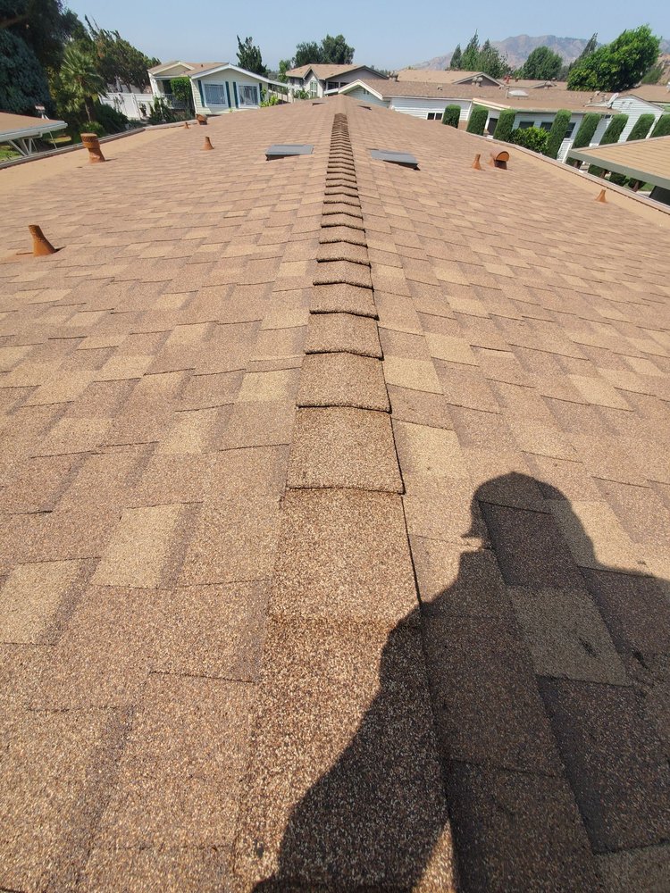 Slide of NRG Roofing