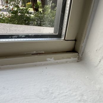 Knock It Out Painting - Sloppy edge. Paint on vinyl window molding and window. Lots of places like this. - Painters Near Me Knock It Out Painting - Sloppy edge. Paint on vinyl window molding and window. Lots of places like this. - Painters Near Me