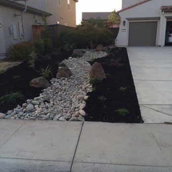 Artificial Turf By Fenix - Grass removed and dry river constructed with drought tolerant plants. - Artificial Turf Near Me - Rocklin, California