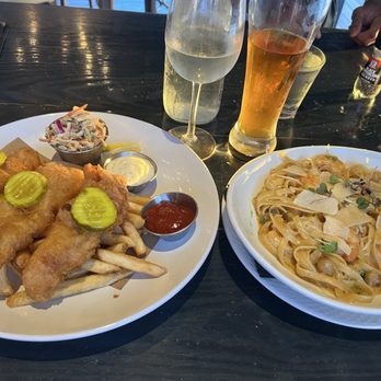 Rising Tide Tap And Table - Fish and frites and blackened seafood Alfredo pasta - American Near Me - Cape Canaveral, Florida Rising Tide Tap And Table - Fish and frites and blackened seafood Alfredo pasta - American Near Me - Cape Canaveral, Florida