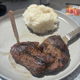 Steak with Rice but well done Steak with Rice but well done