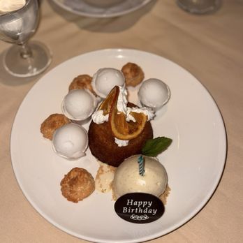 Avra - The orange cake with coconut macaroons, a scoop of vanilla ice cream and four lemon sorbet cups - Greek Near Me - New York, New York Avra - The orange cake with coconut macaroons, a scoop of vanilla ice cream and four lemon sorbet cups - Greek Near Me - New York, New York