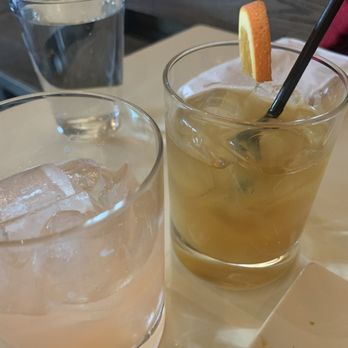 The Well - On the left, Paku Paku and dark rum with orange juice on the right - Bars Near Me - Oakland, California