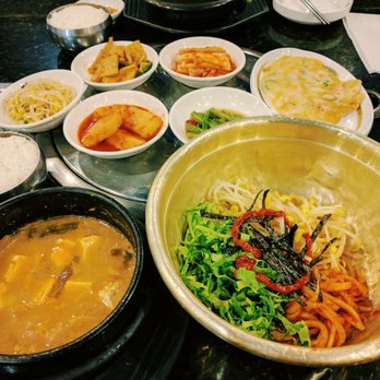 Piggy's Island - Fermented soybean stew (stinky) with bibimbap. Very authentic! All the side dishes were delicious - Korean Near Me - Thornhill, Ontario Piggy's Island - Fermented soybean stew (stinky) with bibimbap. Very authentic! All the side dishes were delicious - Korean Near Me - Thornhill, Ontario