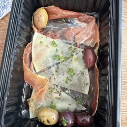 a meal in a plastic container a meal in a plastic container