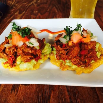Johnny Tequila's - This is tostones with pernil (pulled pork I guess) and avocado with tomatoes and onions. Delicious! - Mexican Near Me - Roselle, New Jersey Johnny Tequila's - This is tostones with pernil (pulled pork I guess) and avocado with tomatoes and onions. Delicious! - Mexican Near Me - Roselle, New Jersey