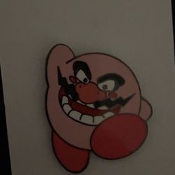 Canis Major - This is the lovely Wario Kirby pin I bought- It is very unique, and I love it.
