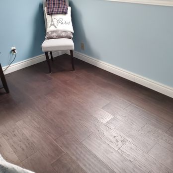 Kenstonework Home Solutions - Engineered hardwood floor installed in bedroom - Handyman Near Me