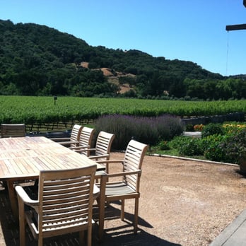 Eagle Eye Winery - a table and chairs outside - Wineries Near Me - Napa, California Eagle Eye Winery - a table and chairs outside - Wineries Near Me - Napa, California