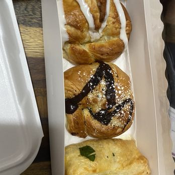 Fresh Croissants - Top-bottom: blueberry cream cheese filled croissant, chocolate and cream cheese filled croissant, spinach feta - Bakeries Near Me - Mesa, Arizona