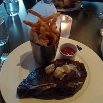 Queensyard - Dry aged rib eye. Was bland. - Modern European Near Me - New York, New York