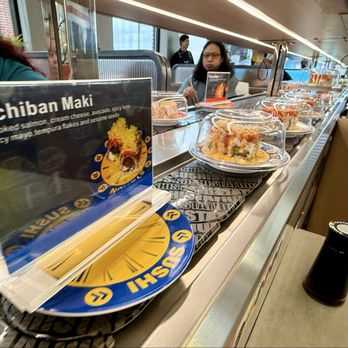 Sushi Station - Signs tell you what kind of sushi follows it on the conveyor. - Conveyor Belt Sushi Near Me - Westfield, Indiana Sushi Station - Signs tell you what kind of sushi follows it on the conveyor. - Conveyor Belt Sushi Near Me - Westfield, Indiana